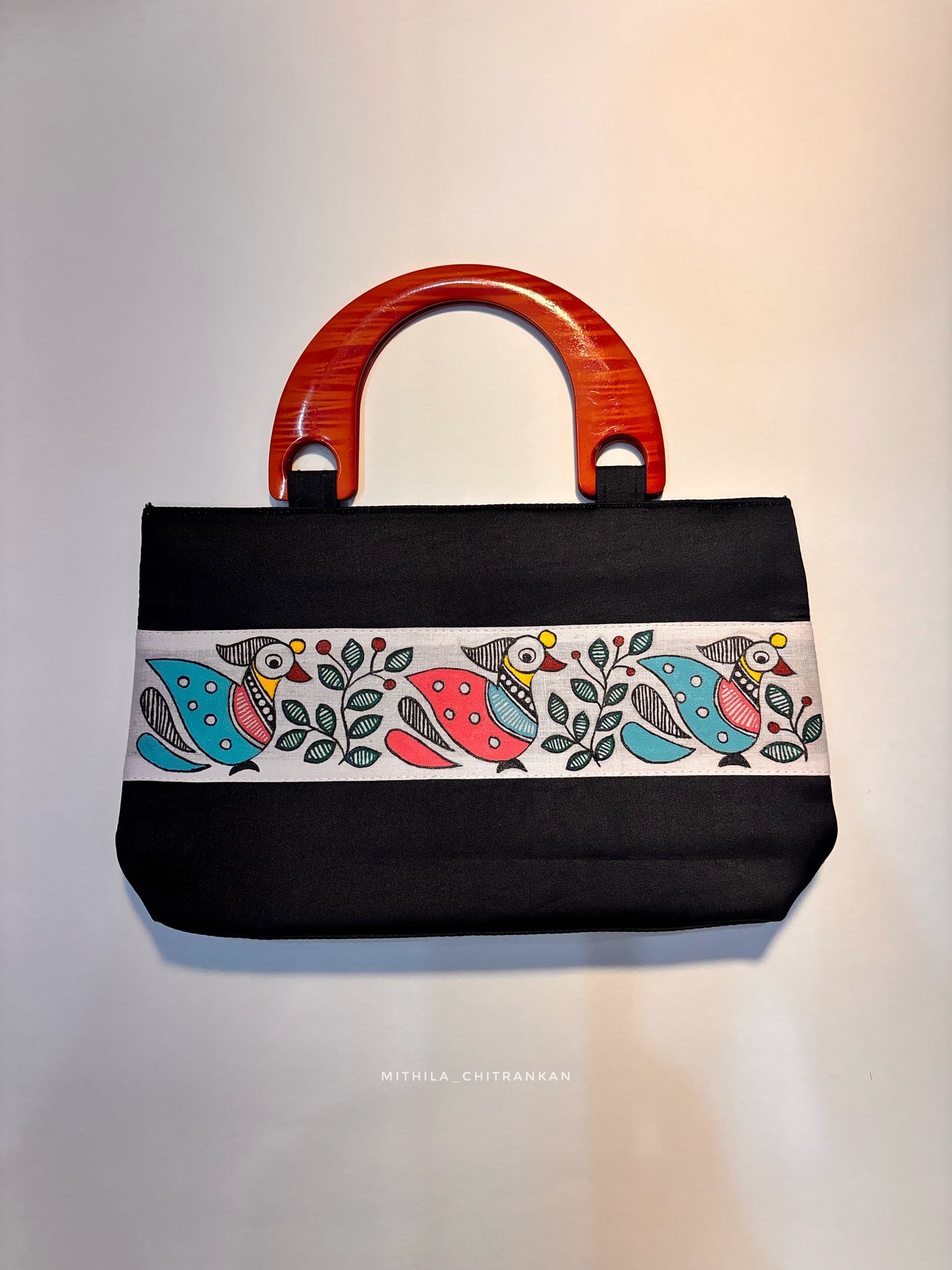 Colourful bird hand bag