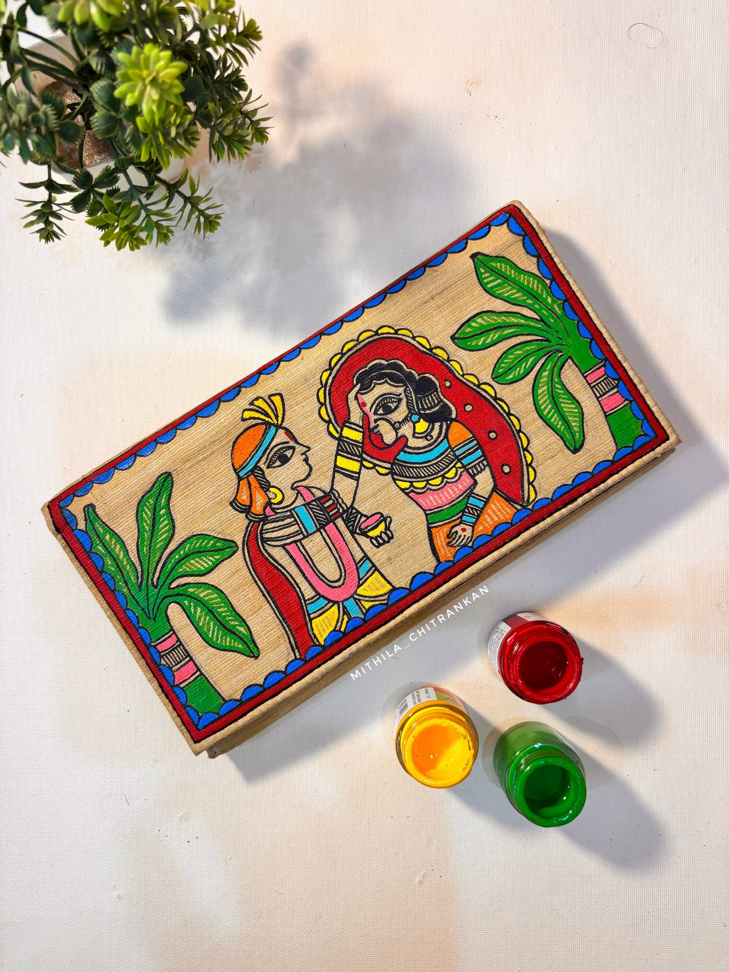 Sindoordan hand painted silk clutch