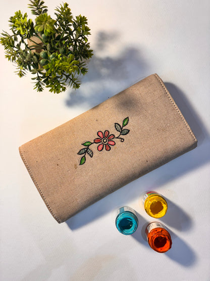 Peacock motif jute clutch
