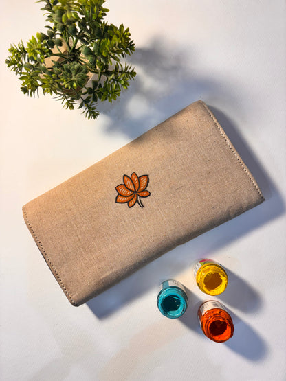 Lotus motif handpainted jute clutch
